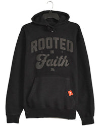 Black hoodie with 'Rooted in Faith' text on a white background